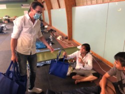 Exilés accueillis au Palais des Sports · Alfortville (crédits : Hervé Pilet) Exilés accueillis au Palais des Sports · Alfortville (crédits : Hervé Pilet)